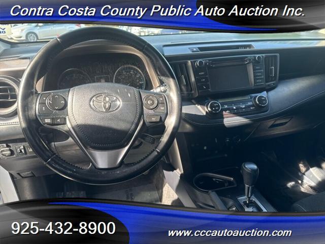 used 2018 Toyota RAV4 car, priced at $19,580