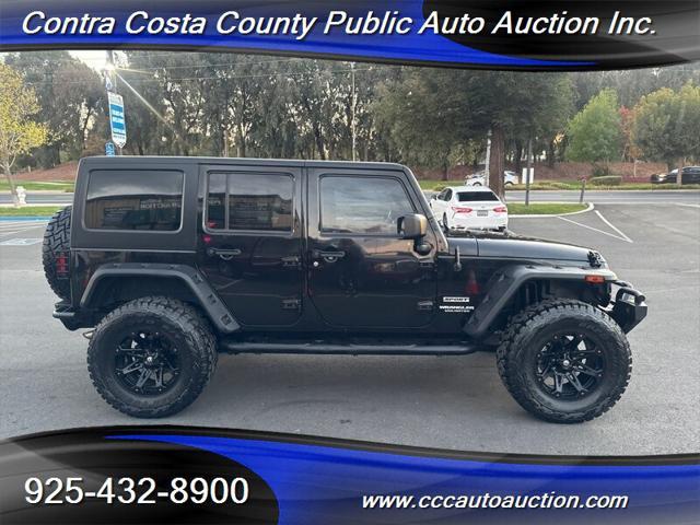 used 2015 Jeep Wrangler Unlimited car, priced at $22,990