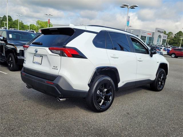 used 2024 Toyota RAV4 Hybrid car, priced at $35,000