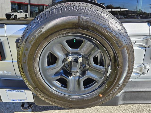 used 2023 Jeep Wrangler car, priced at $18,000