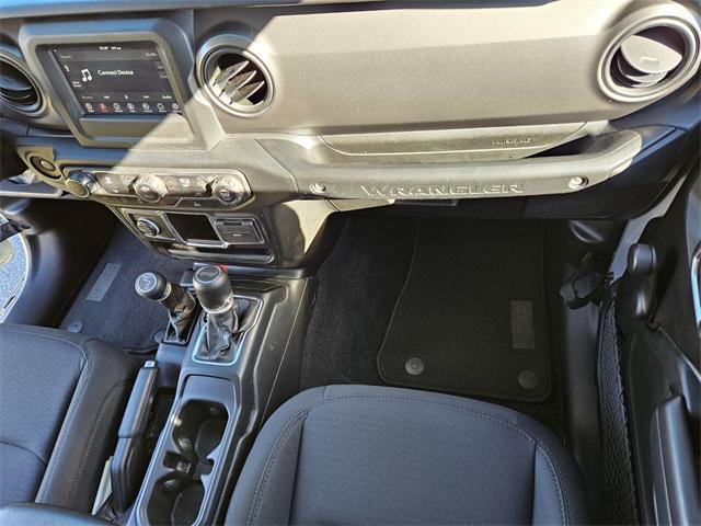 used 2023 Jeep Wrangler car, priced at $18,000