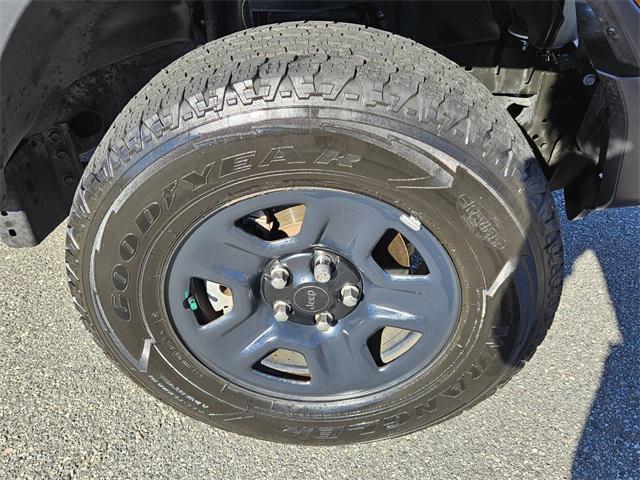 used 2023 Jeep Wrangler car, priced at $18,000