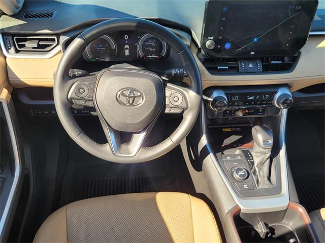 used 2023 Toyota RAV4 Hybrid car, priced at $35,000