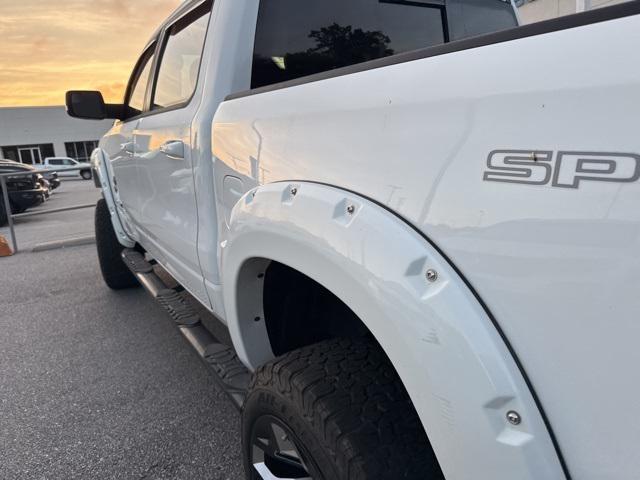used 2021 Ram 1500 car, priced at $35,143