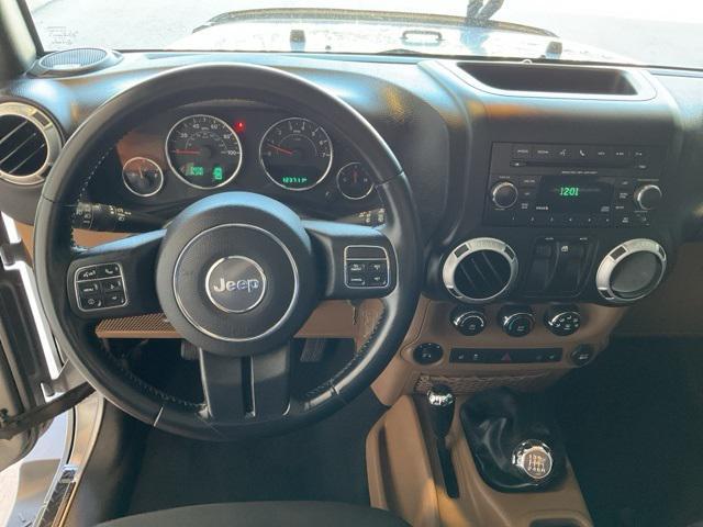 used 2015 Jeep Wrangler car, priced at $14,338