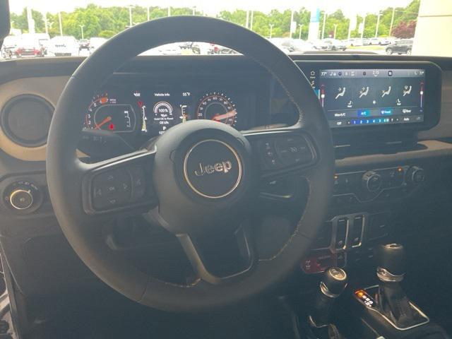 used 2024 Jeep Wrangler car, priced at $38,342