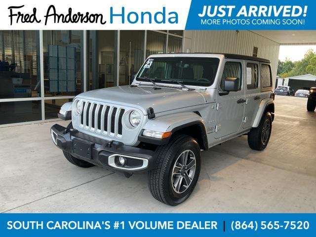 used 2023 Jeep Wrangler car, priced at $28,142