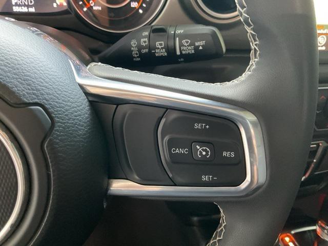 used 2023 Jeep Wrangler car, priced at $28,142