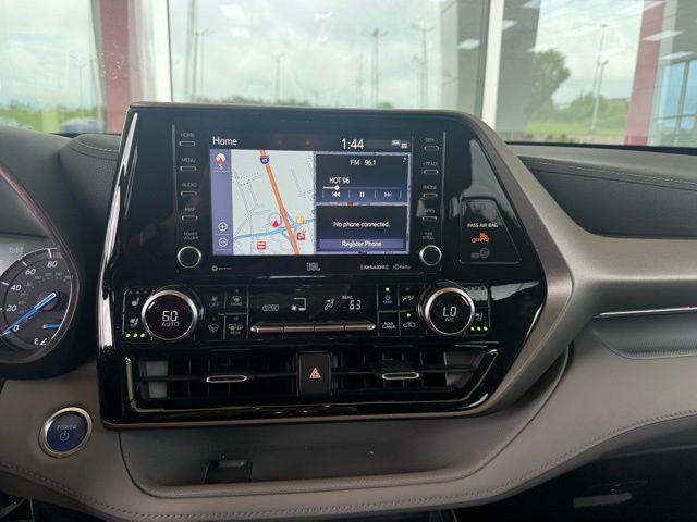 used 2021 Toyota Highlander Hybrid car, priced at $30,757