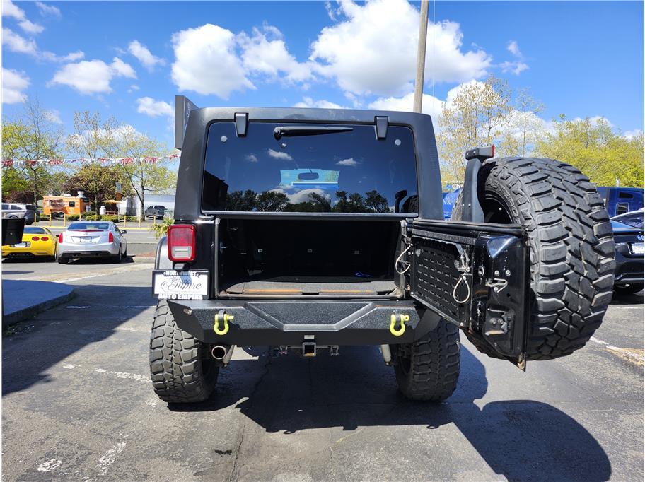 used 2013 Jeep Wrangler Unlimited car, priced at $12,750