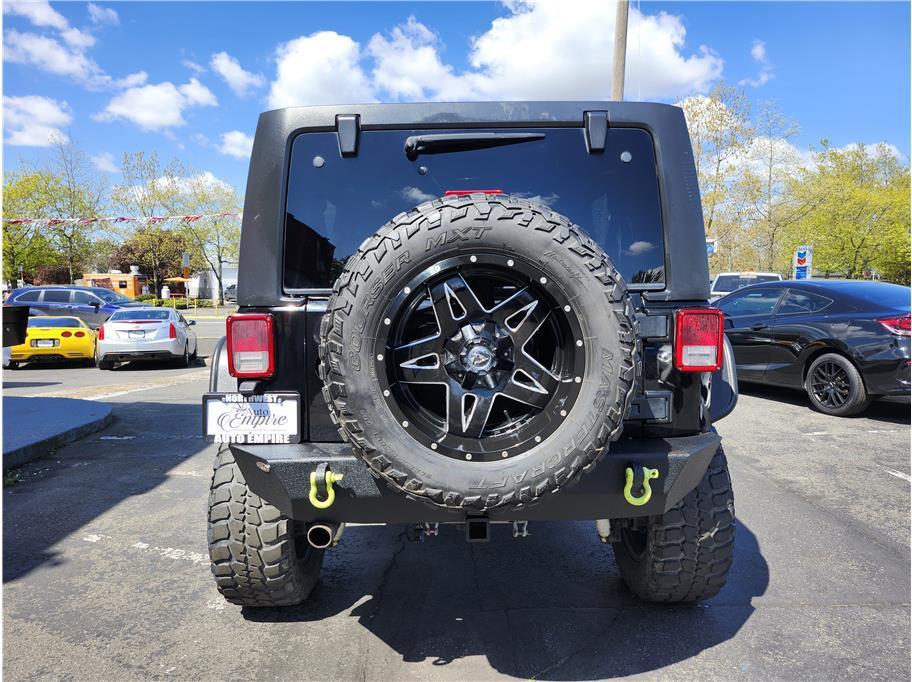 used 2013 Jeep Wrangler Unlimited car, priced at $12,750