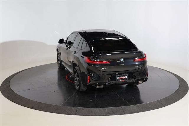 used 2023 BMW X4 car, priced at $47,981