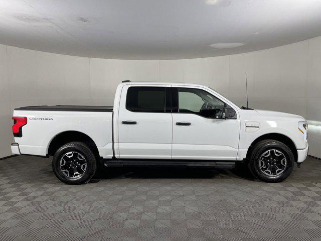 used 2023 Ford F-150 Lightning car, priced at $39,997