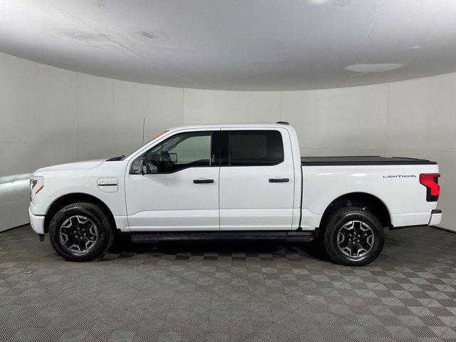 used 2023 Ford F-150 Lightning car, priced at $39,997