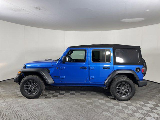 used 2024 Jeep Wrangler car, priced at $37,297