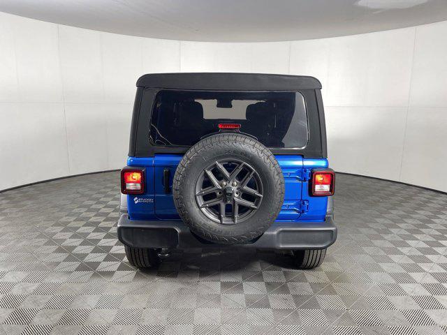 used 2024 Jeep Wrangler car, priced at $37,297