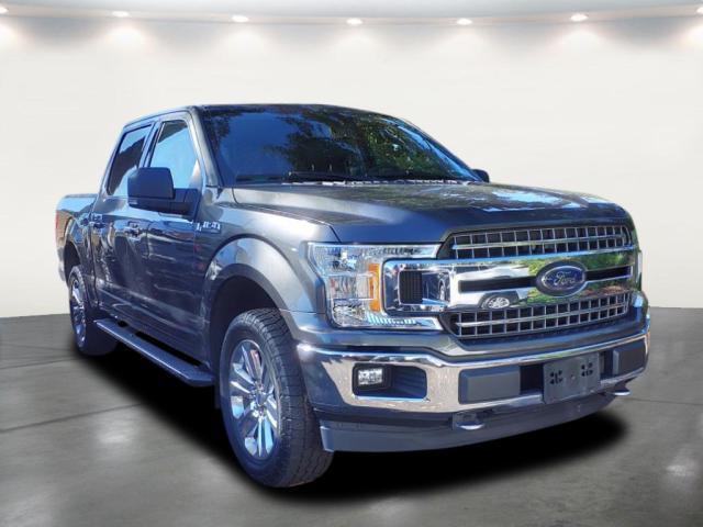 used 2018 Ford F-150 car, priced at $28,027