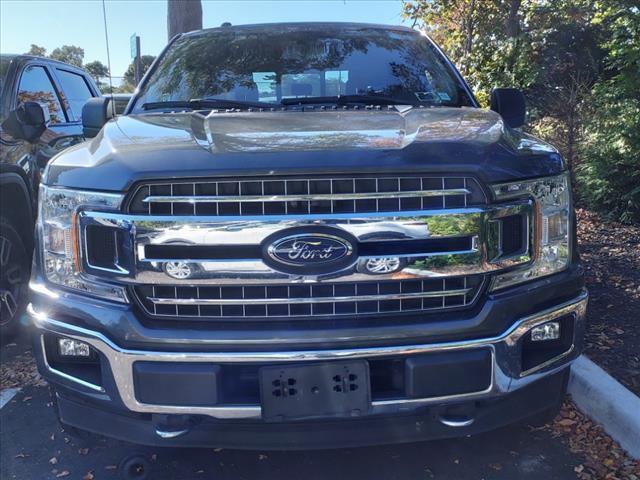 used 2018 Ford F-150 car, priced at $28,027