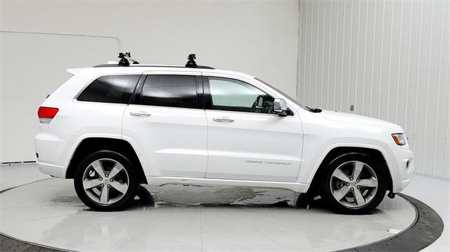 used 2014 Jeep Grand Cherokee car, priced at $14,860