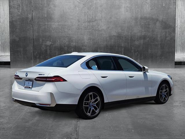 used 2024 BMW i5 car, priced at $58,488
