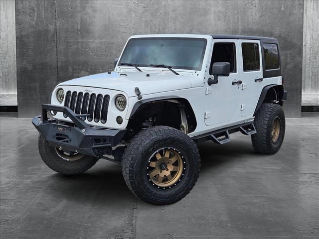 used 2015 Jeep Wrangler Unlimited car, priced at $18,444