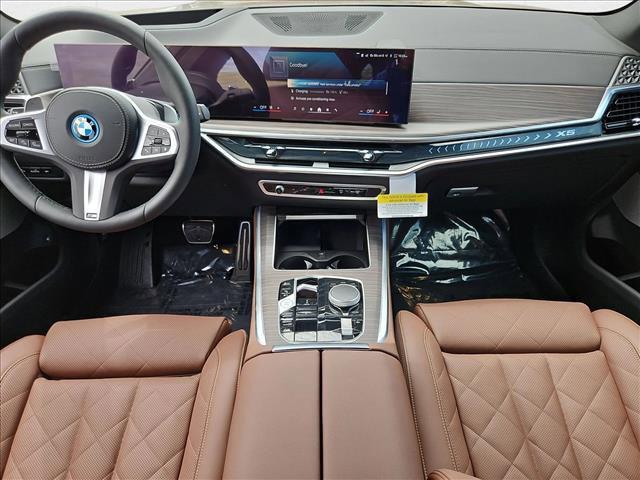 used 2026 BMW X5 PHEV car, priced at $86,675