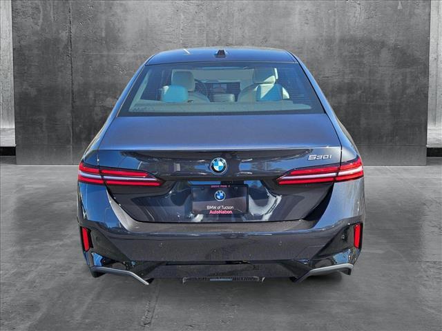 new 2025 BMW 530 car, priced at $63,920