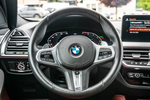 used 2025 BMW X4 car, priced at $50,992