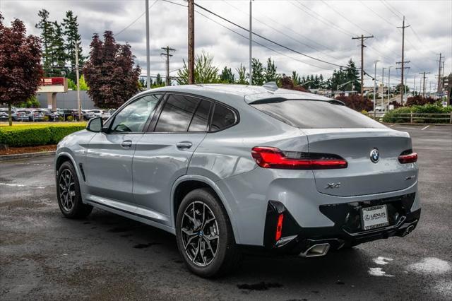 used 2025 BMW X4 car, priced at $50,992