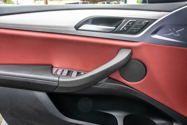 used 2025 BMW X4 car, priced at $50,992