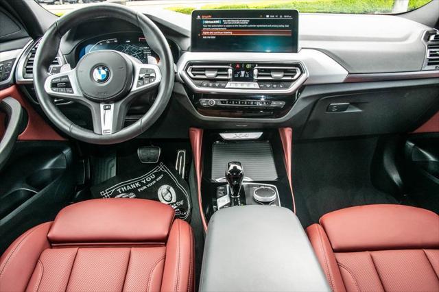 used 2025 BMW X4 car, priced at $50,992