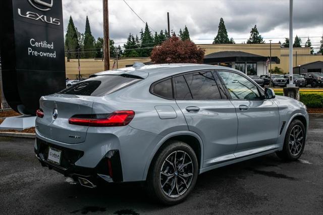 used 2025 BMW X4 car, priced at $50,992