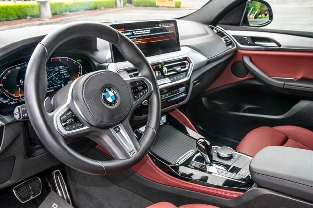 used 2025 BMW X4 car, priced at $50,992
