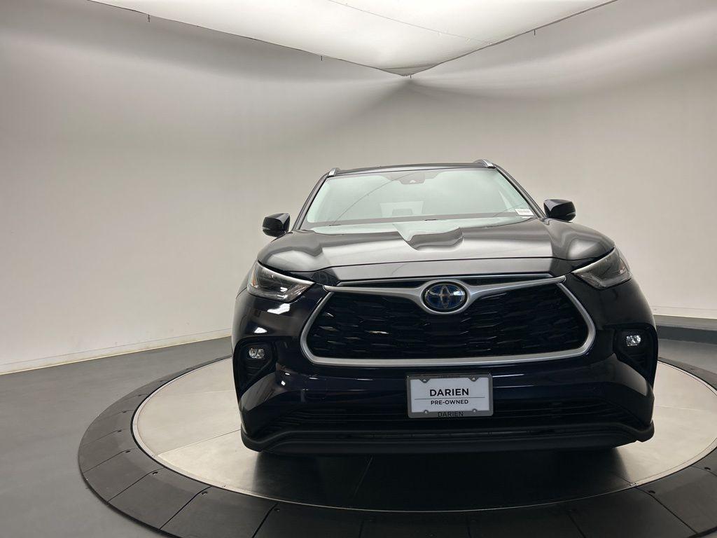 used 2021 Toyota Highlander Hybrid car, priced at $29,598