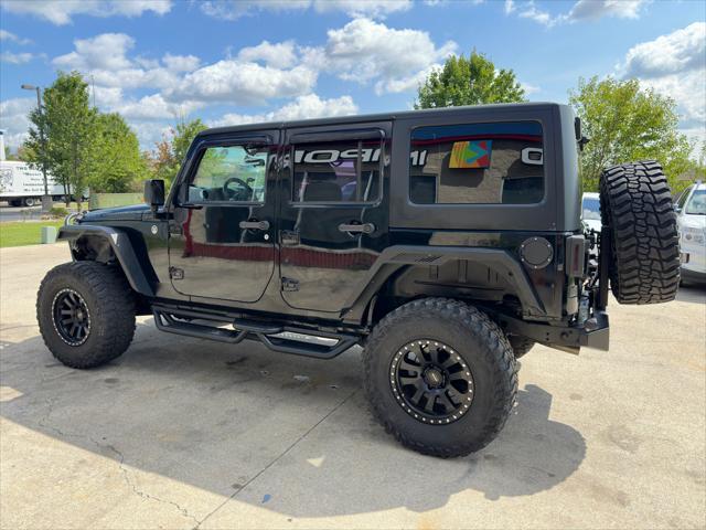 used 2013 Jeep Wrangler Unlimited car, priced at $16,900