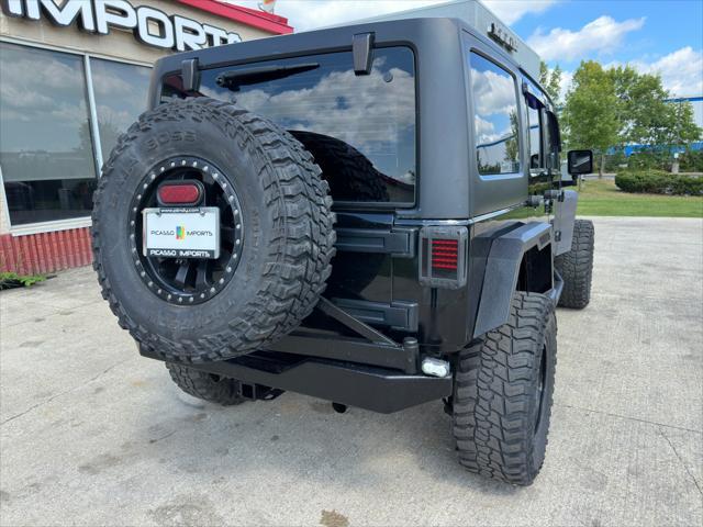 used 2013 Jeep Wrangler Unlimited car, priced at $16,900