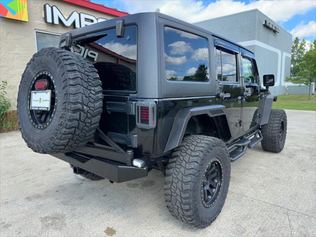 used 2013 Jeep Wrangler Unlimited car, priced at $16,900