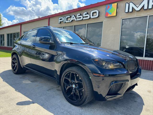 used 2012 BMW X6 M car, priced at $19,000