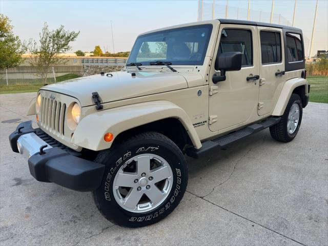 used 2011 Jeep Wrangler Unlimited car, priced at $15,800