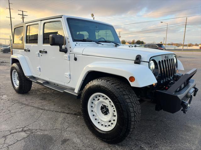 used 2016 Jeep Wrangler Unlimited car, priced at $12,500