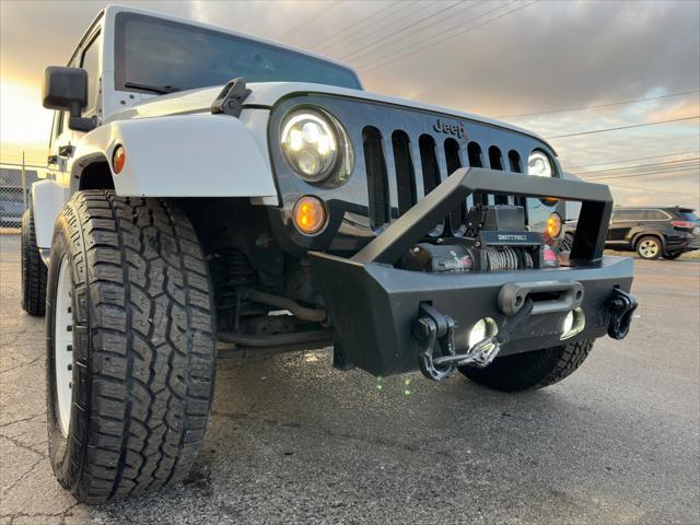 used 2016 Jeep Wrangler Unlimited car, priced at $12,500