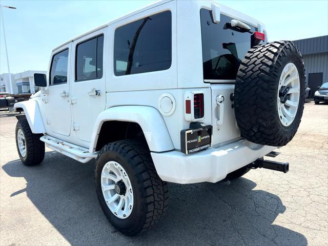 used 2013 Jeep Wrangler Unlimited car, priced at $15,900