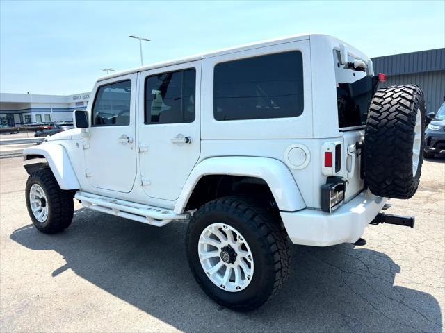 used 2013 Jeep Wrangler Unlimited car, priced at $15,900