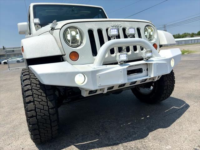 used 2013 Jeep Wrangler Unlimited car, priced at $15,900