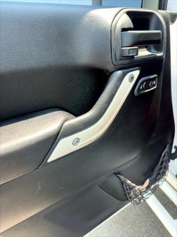 used 2013 Jeep Wrangler Unlimited car, priced at $15,900