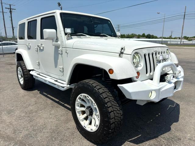 used 2013 Jeep Wrangler Unlimited car, priced at $15,900
