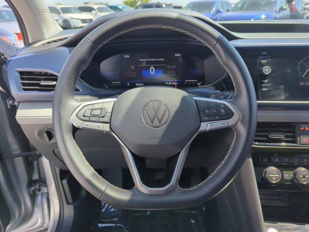 used 2024 Volkswagen Taos car, priced at $22,158