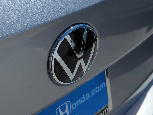 used 2024 Volkswagen Taos car, priced at $22,158