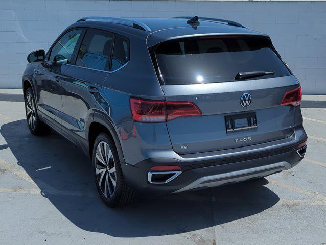 used 2024 Volkswagen Taos car, priced at $22,999