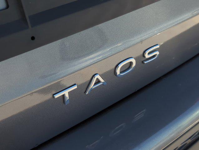 used 2024 Volkswagen Taos car, priced at $22,999